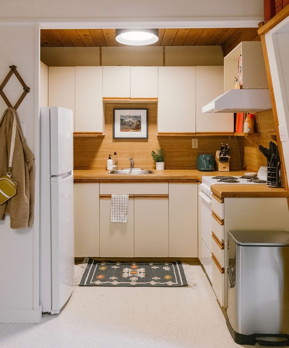 Our small but fully-stocked kitchen has everything you need to prepare meals.