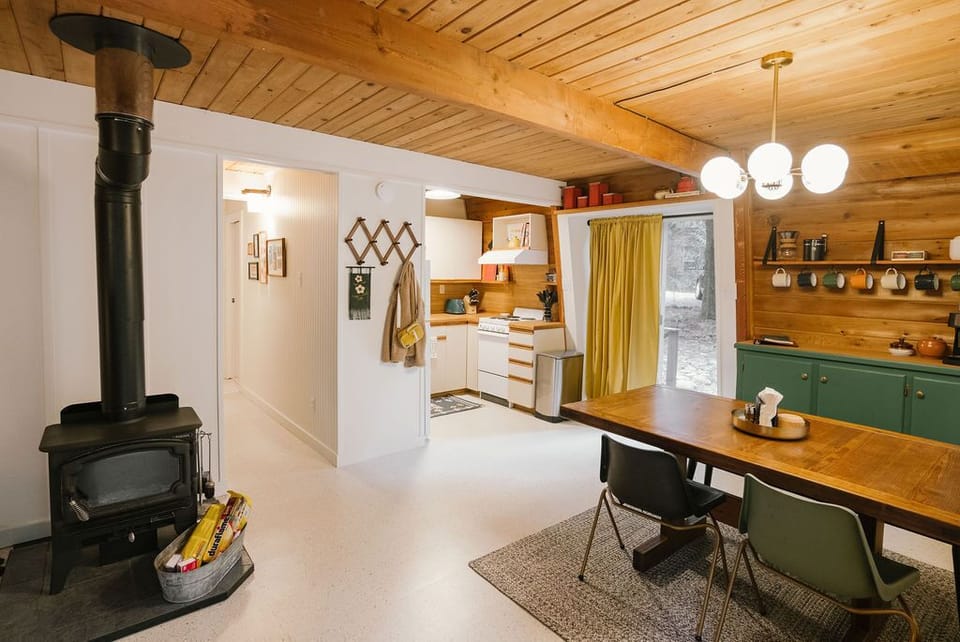 Step into the kitchen and dining area, located just inside the entrance.