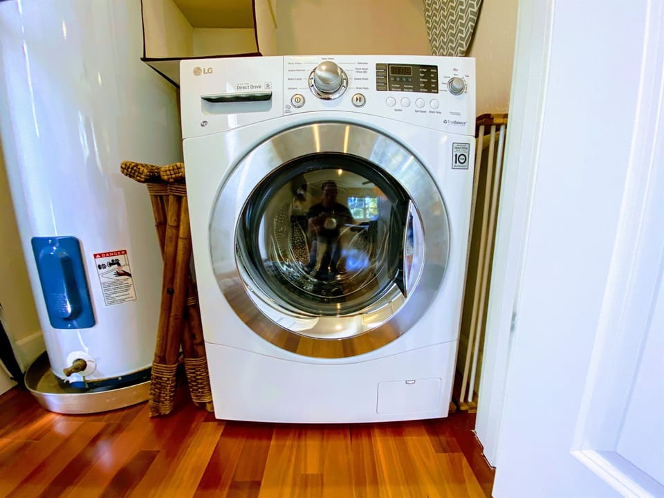 European style washer/dryer combo.  Laundry detergent provided.