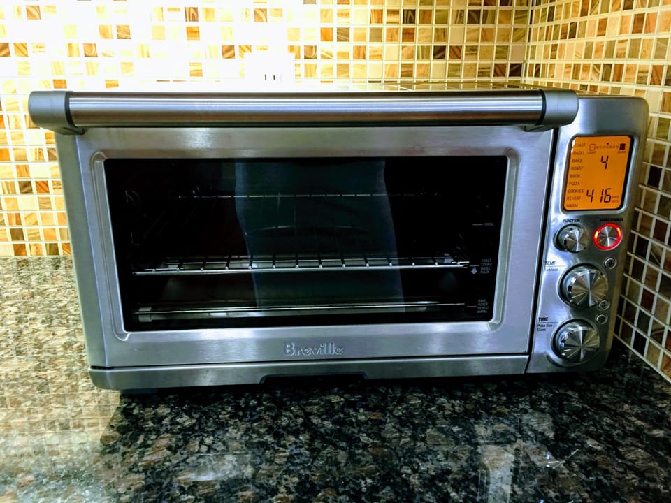 Countertop convection oven.  Cooks succulent chicken and perfect pizza.