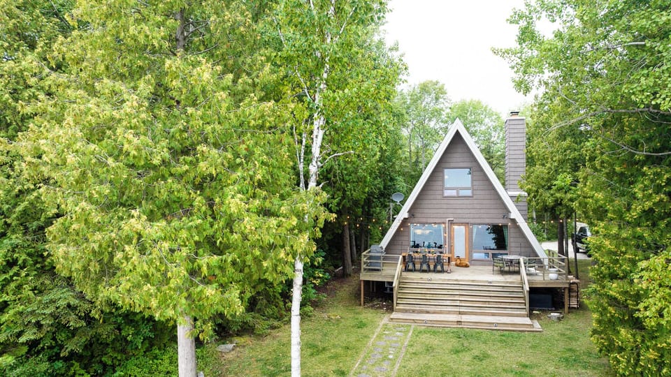 An A-frame in the woods, off the beaten path in Door County yet close to it all.