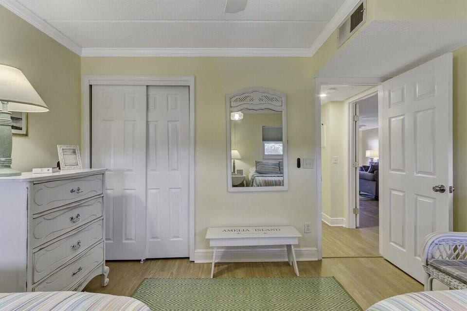 Guest Bedroom has Dresser and Closet
