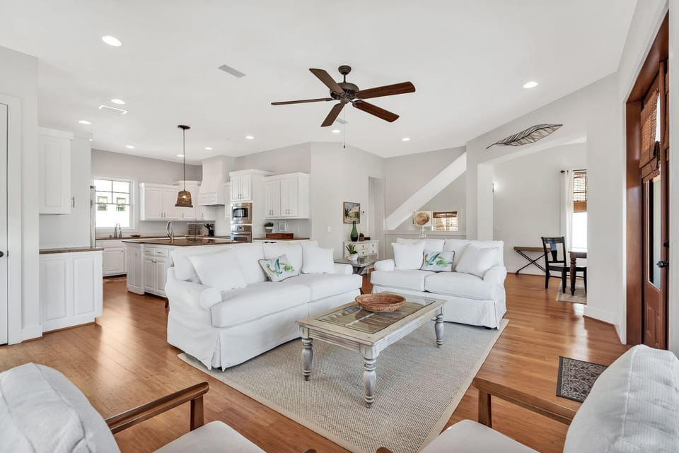 Open concept gathering room with ocean view balcony (second level)