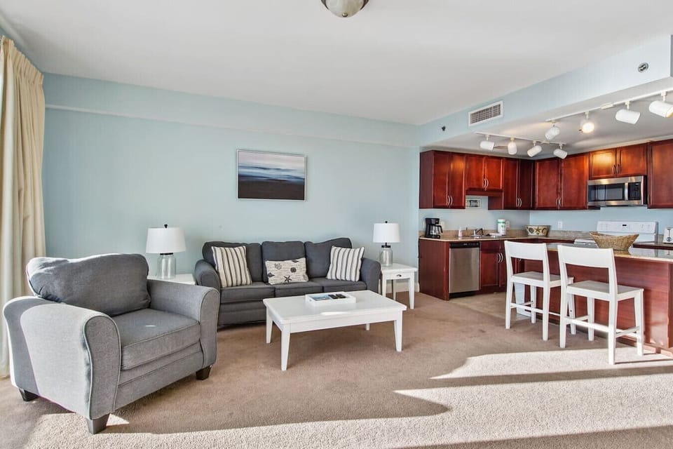 Living room with flat screen TV, fold out sofa, and magnificent views