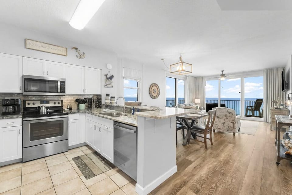 View of Fully stocked Kitchen, Dining, Living Room