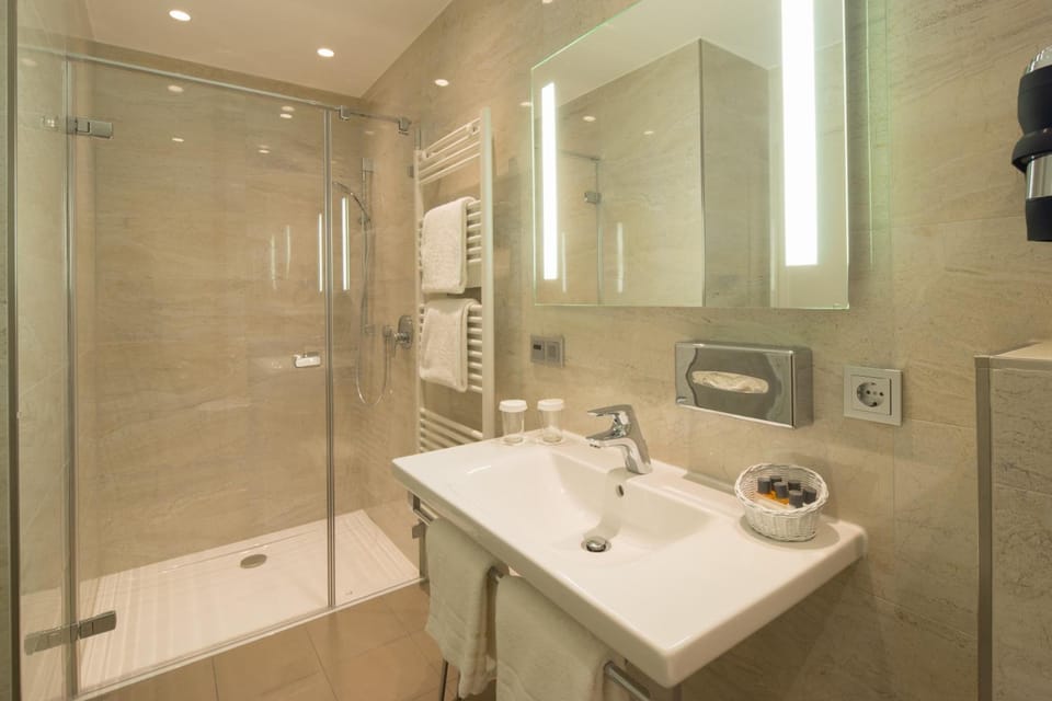Shower, free toiletries, hair dryer, towels