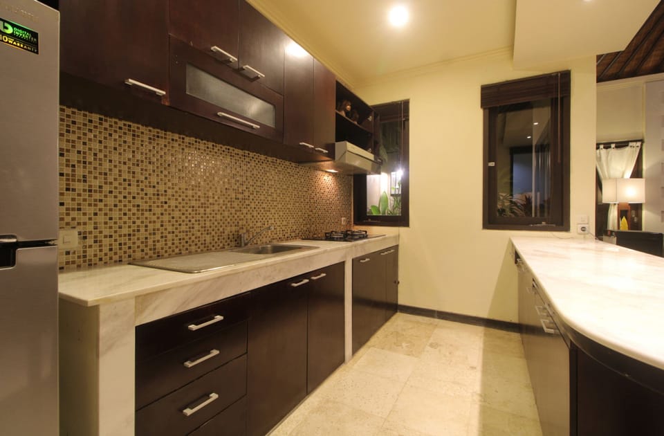 Exclusive Villa | Private kitchen | Fridge, microwave, coffee/tea maker, electric kettle