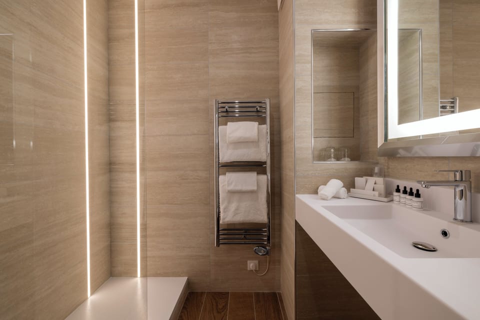 Shower, free toiletries, hair dryer, slippers