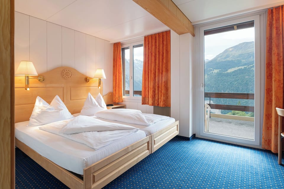 Twin Room, Balcony, Mountain View | In-room safe, desk, free cribs/infant beds, rollaway beds