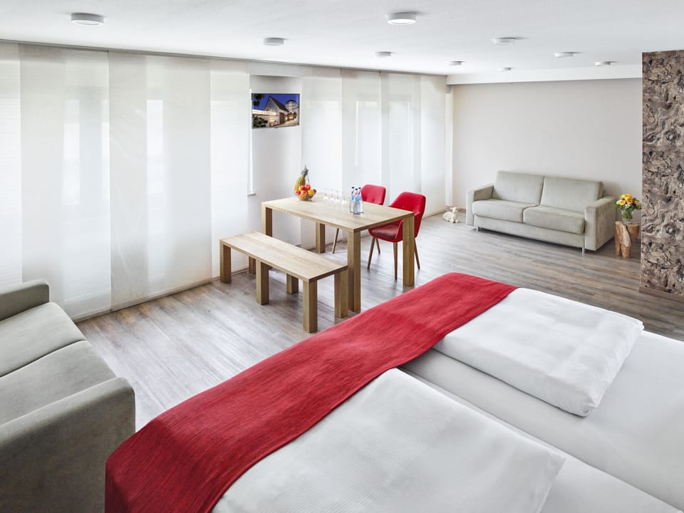 Premium Deluxe Room | Living area | 68-cm TV with cable channels