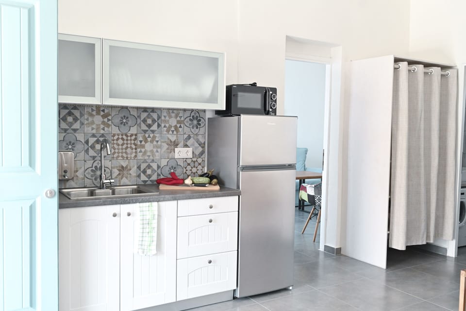 Grand Sea View Apartment | Private kitchen | Full-size fridge, microwave, espresso maker, electric kettle