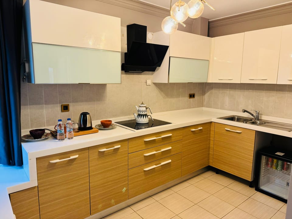 Family Room, Sea View | Private kitchen | Electric kettle, highchair