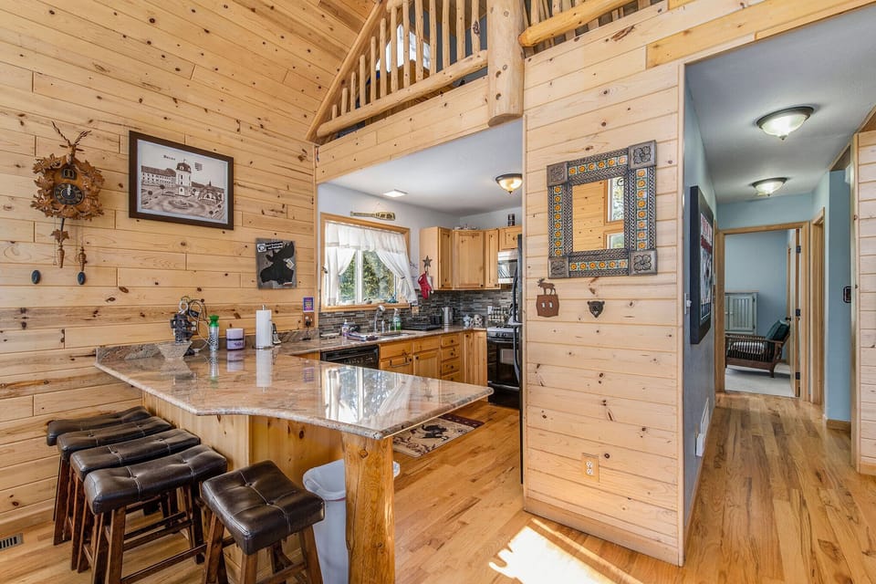 - Pull up a stool and enjoy breakfast at the granite bar overlooking a warm, rustic kitchen
