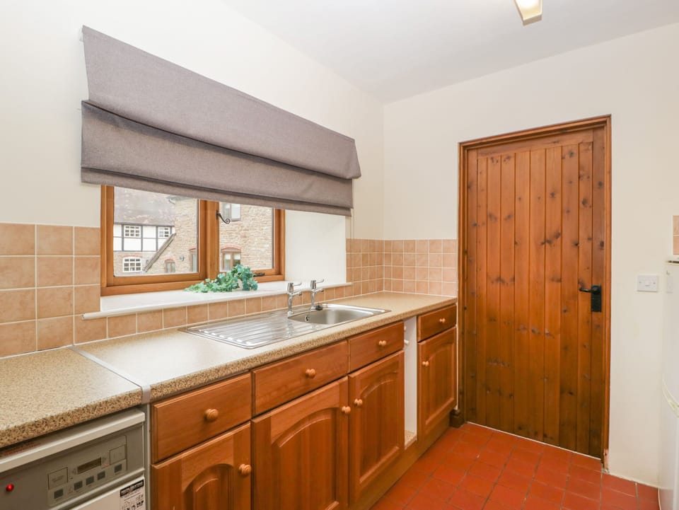 Fridge, electric kettle, toaster, cookware/dishes/utensils