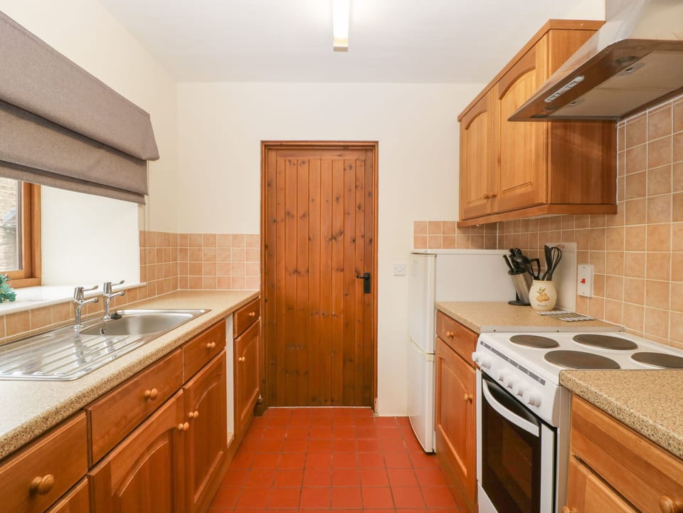 Fridge, electric kettle, toaster, cookware/dishes/utensils