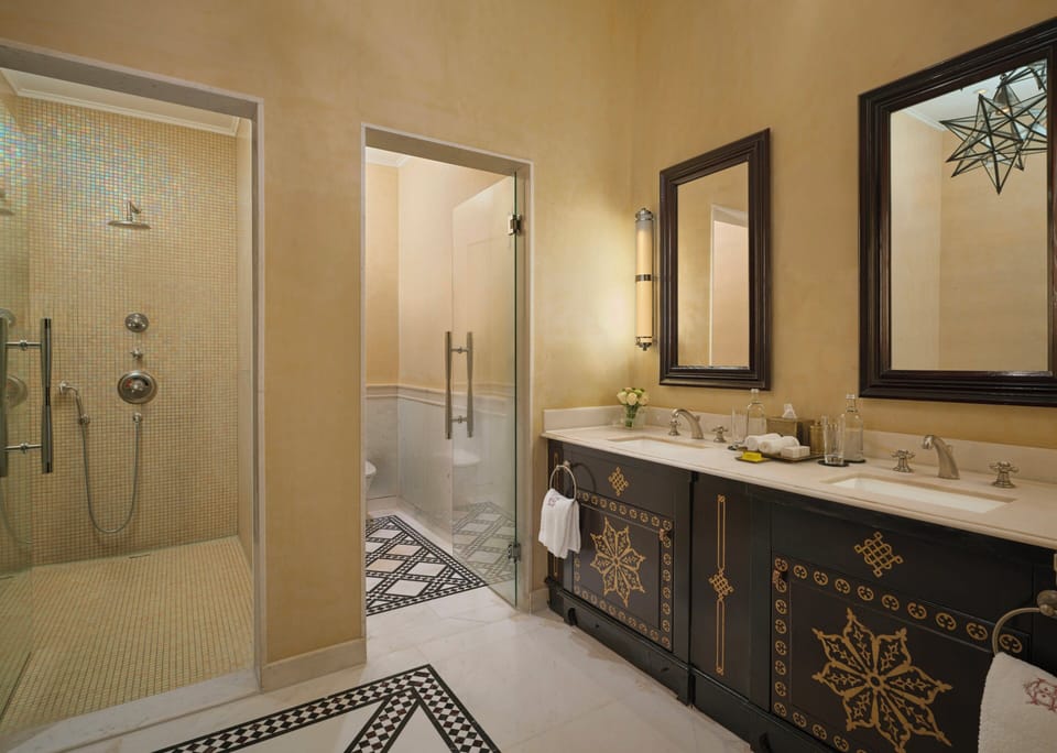 Suite (Palace Cataract Nile View) | Bathroom | Combined shower/tub, eco-friendly toiletries, hair dryer, bathrobes