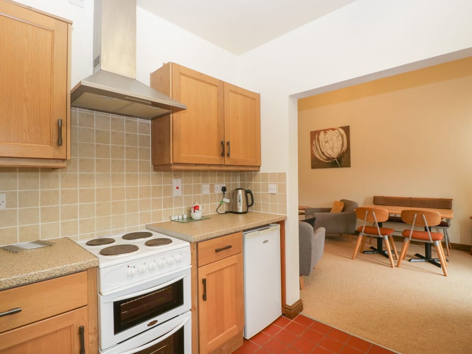 Fridge, electric kettle, toaster, cookware/dishes/utensils