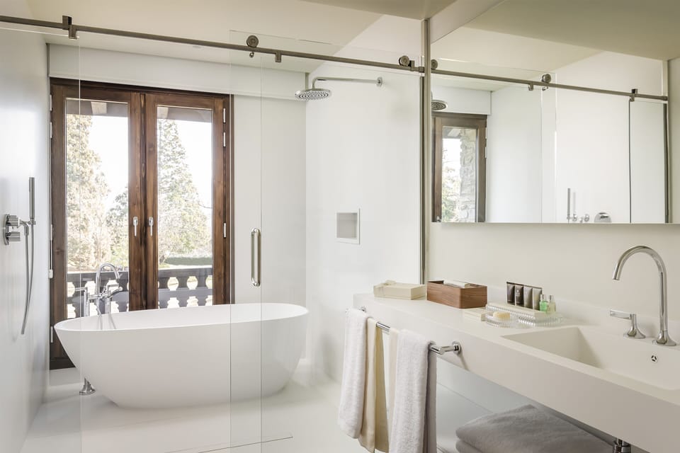 Designer toiletries, hair dryer, bathrobes, slippers