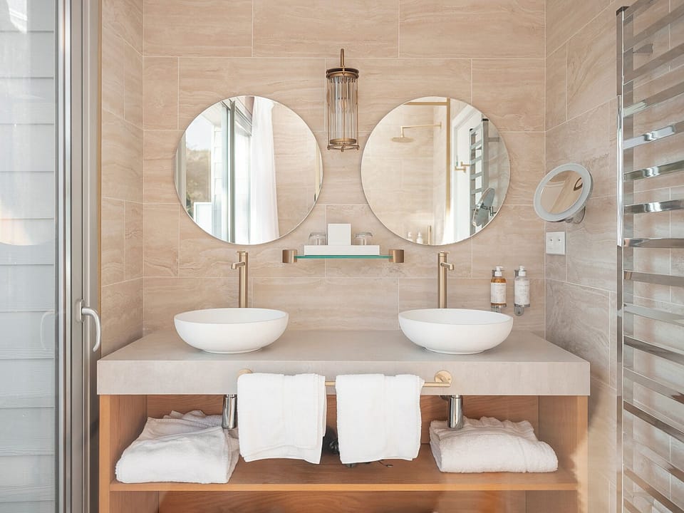 Suite, Sea View | Bathroom | Free toiletries, hair dryer, slippers, towels