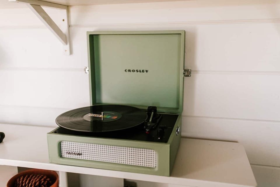 The upstairs loft is uniquely designed to be a relaxing space where you can fully immerse yourself into the pages of your next read or the sounds of your favorite vinyl album on the Crosby record player.