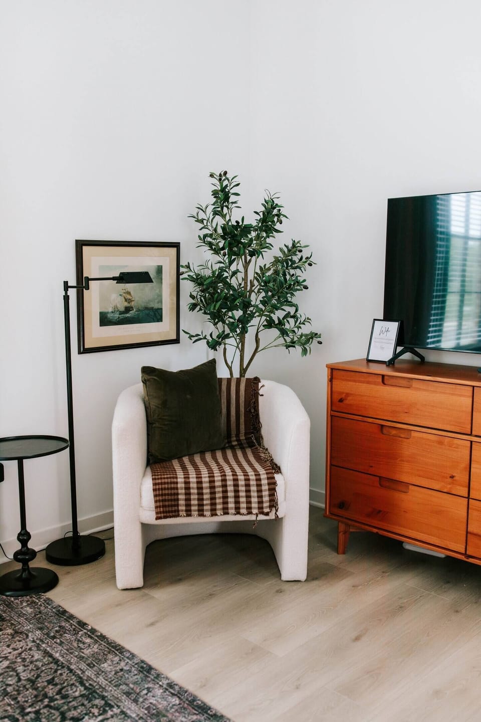 Cozy corner goals. Curl up with a good book or unwind after a day of exploring — this thoughtfully designed nook is the perfect blend of comfort and style. 