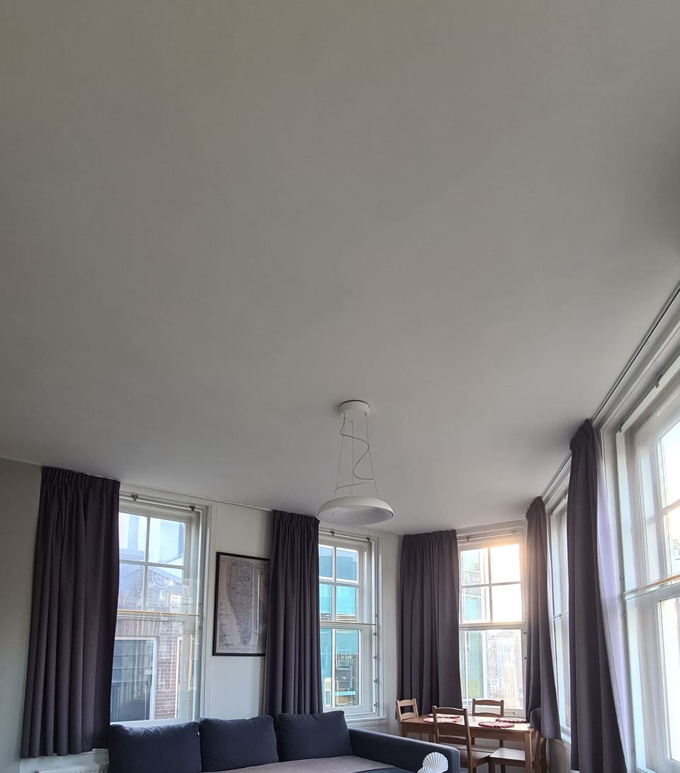 City Apartment | Living area | 45-inch flat-screen TV with digital channels, TV