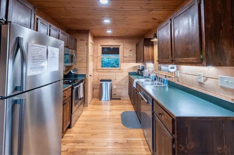 Fully stocked kitchen with enough place settings for 16.