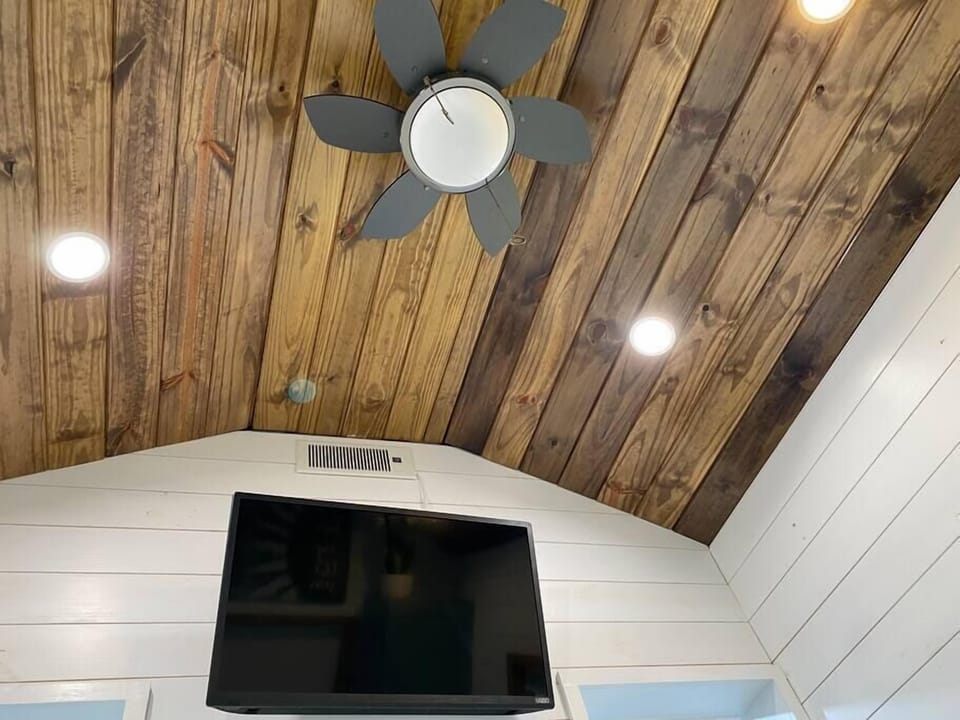 This little ceiling fan may look tiny, but it is mighty. And perfect for a small house.