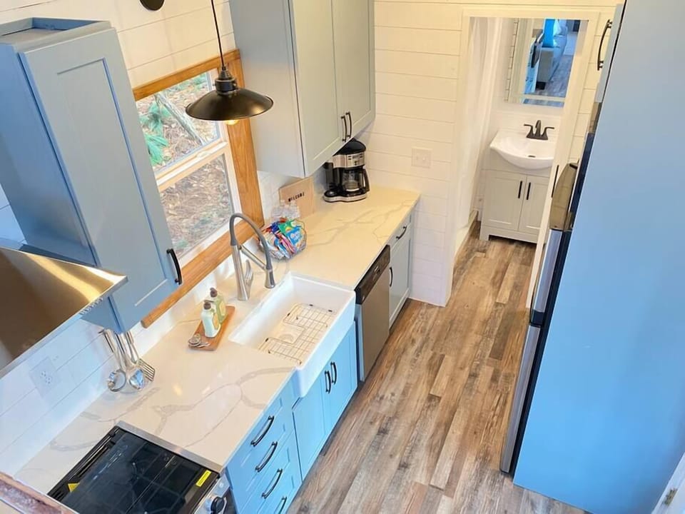 Looking down from the loft shows the beauty of the Quartz countertops.