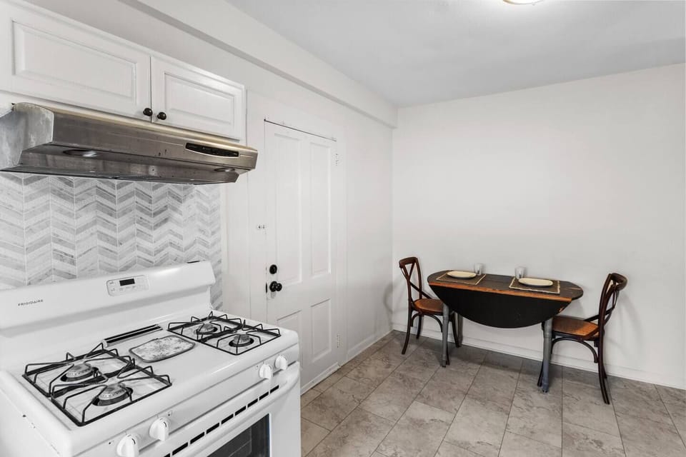 Adjacent to the cooking area, discover a cozy dining nook where you can enjoy your meals in a relaxed and intimate setting. Whether it's a quick breakfast or a leisurely dinner, this space adds to the overall charm of our kitchen.