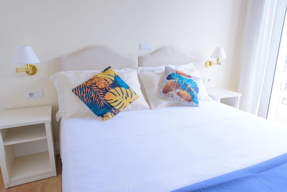 Classic Double or Twin Room | Minibar, in-room safe, desk, laptop workspace