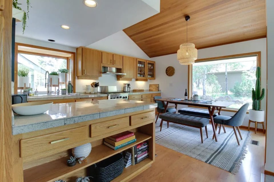 A large kitchen island provides plenty of counter space for making gourmet meals