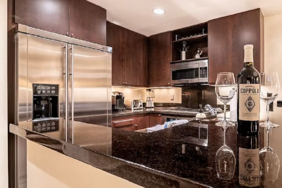 High end appliances and lots of amenities in the kitchen.