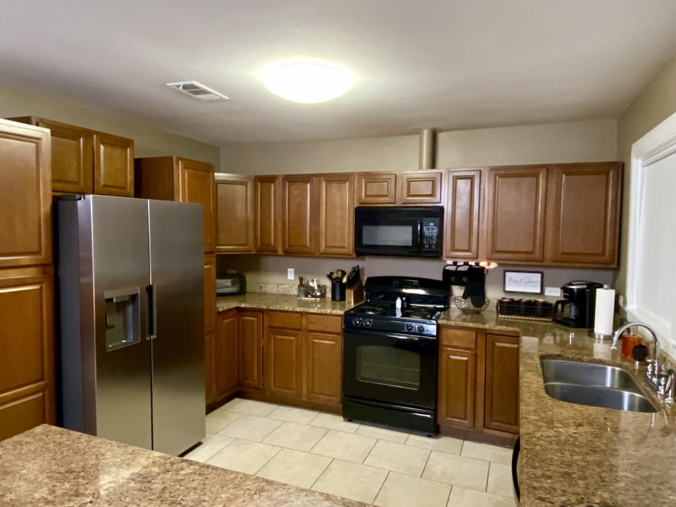 Large kitchen with new appliances. Well equipped with everything you will need.