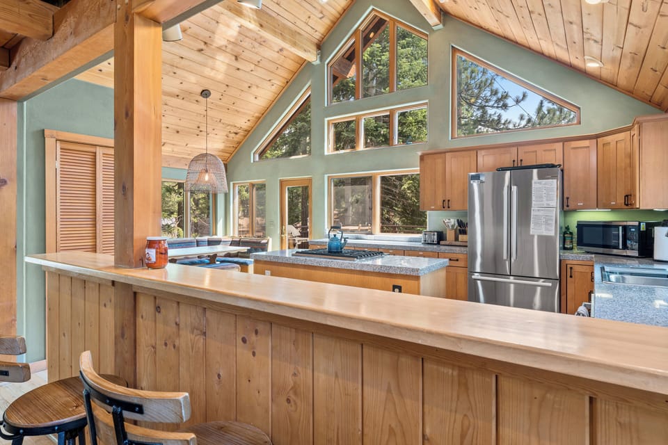 Large kitchen with updated appliances and gas stove for cooking delicious meals!