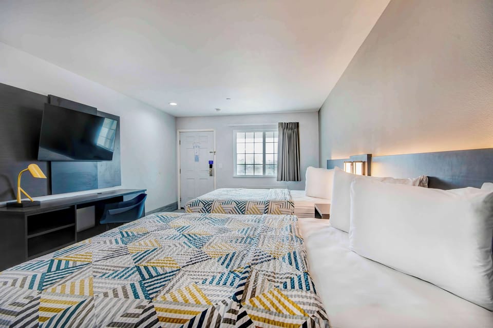 Desk, laptop workspace, free WiFi, bed sheets