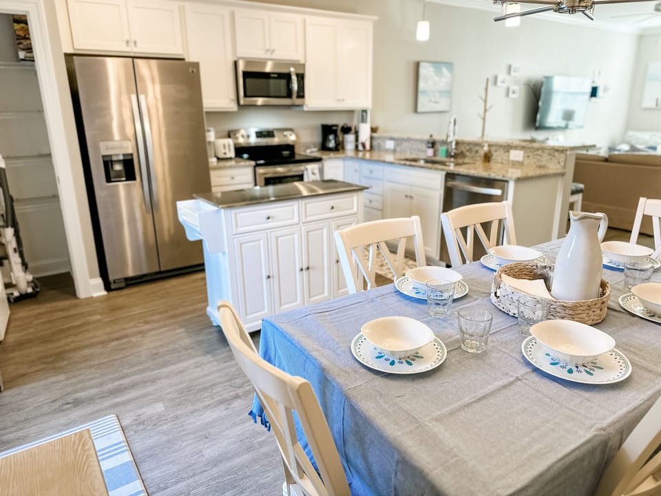 Fully stocked kitchen with all types of cooking and serving ware