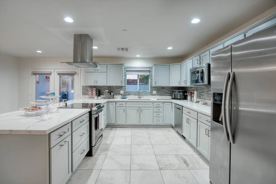 Newly updated fully equipped kitchen with all electric stainless steel Electrolux appliances