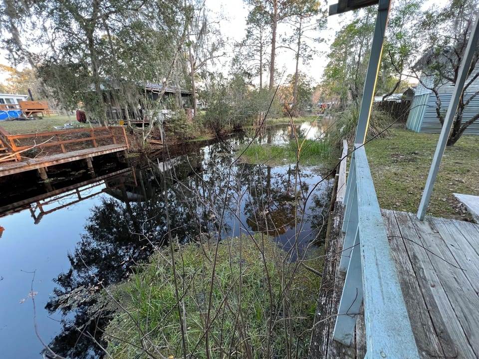 From the covered short deck area at the canal
