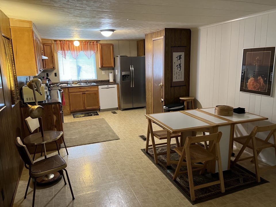 This table is actually folded up and ready to use if needed in the living area.
