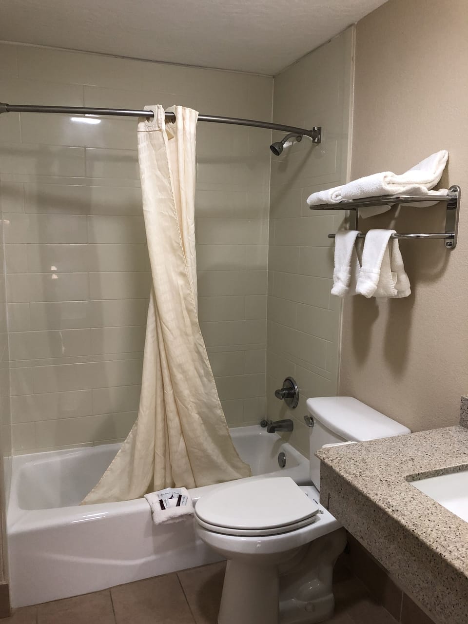 Room, 2 Queen Beds, Non Smoking | Bathroom | Combined shower/tub, hair dryer, towels