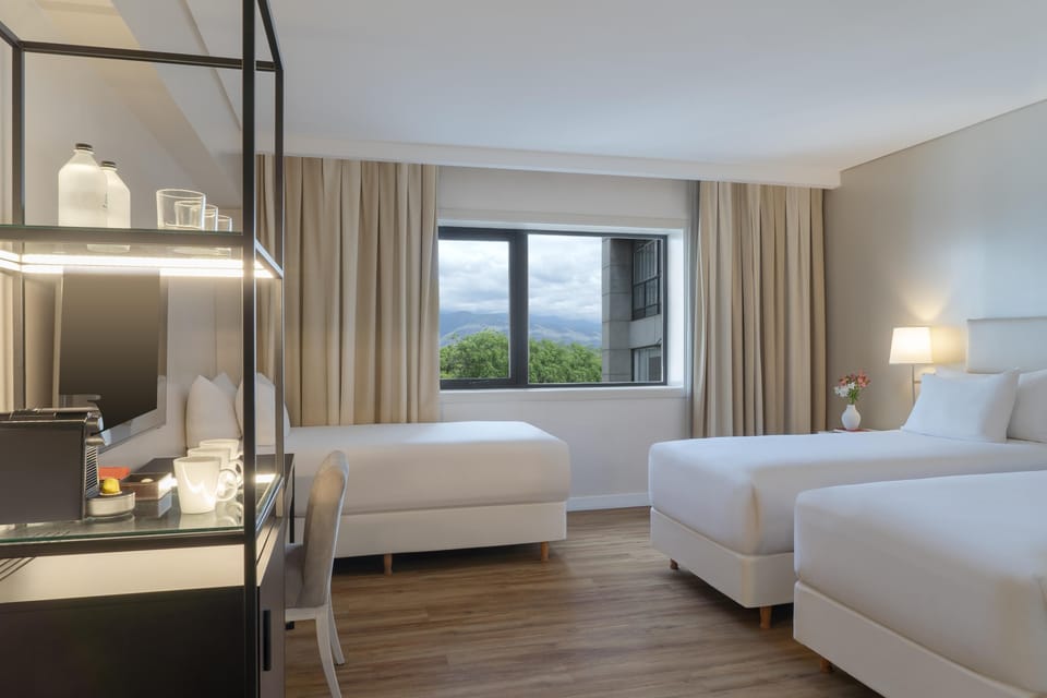 Family Triple Room | Premium bedding, down comforters, pillowtop beds, minibar