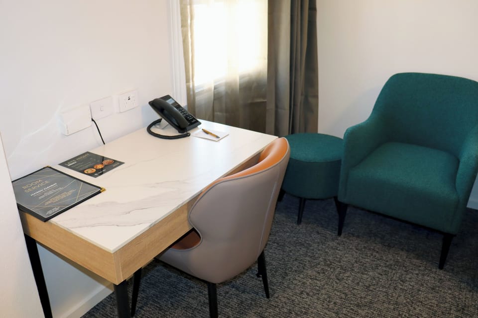 Executive Suite, 1 Bedroom - Newly Refurbished | Living area | LCD TV