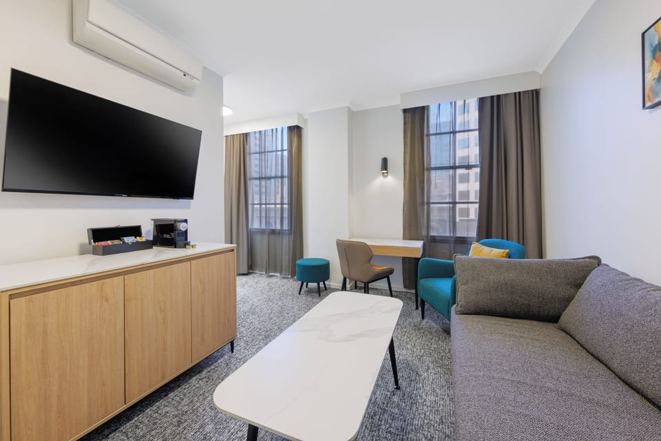 Executive Suite, 1 Bedroom - Newly Refurbished | Living area | LCD TV