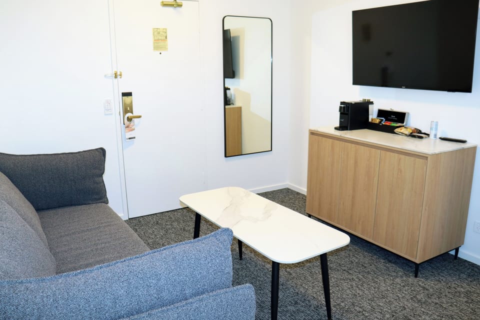 Executive Suite, 1 Bedroom - Newly Refurbished | Living area | LCD TV