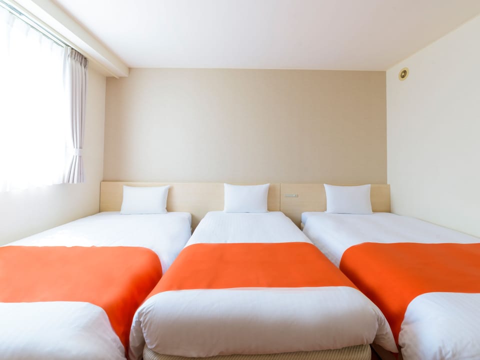 Premium bedding, desk, blackout drapes, iron/ironing board (on request)