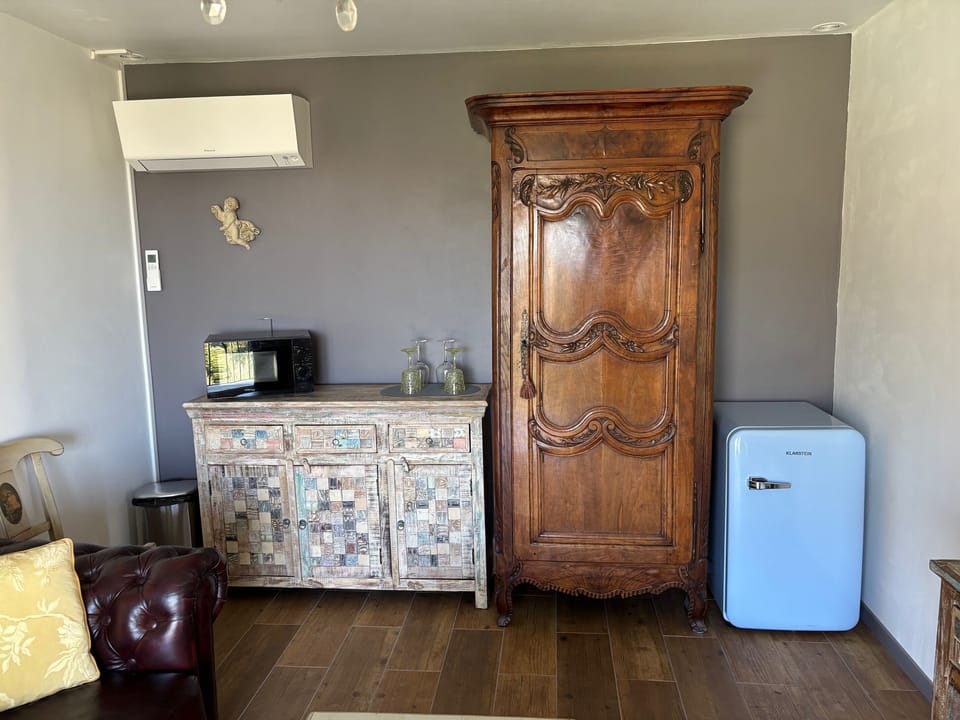 Panoramic Double Room | Living area | Flat-screen TV