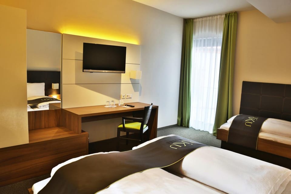 Hypo-allergenic bedding, desk, blackout drapes, soundproofing