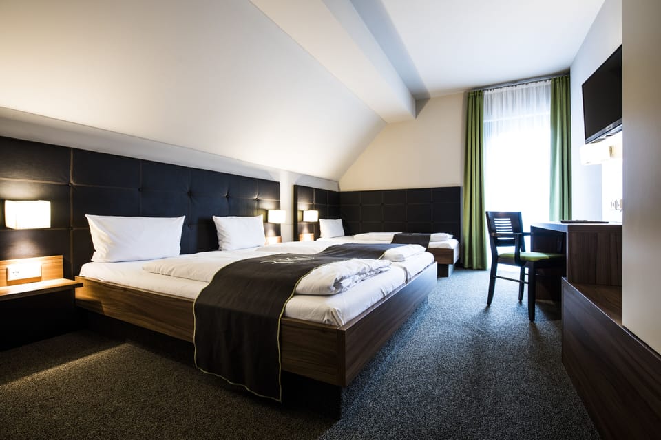 Hypo-allergenic bedding, desk, blackout drapes, soundproofing