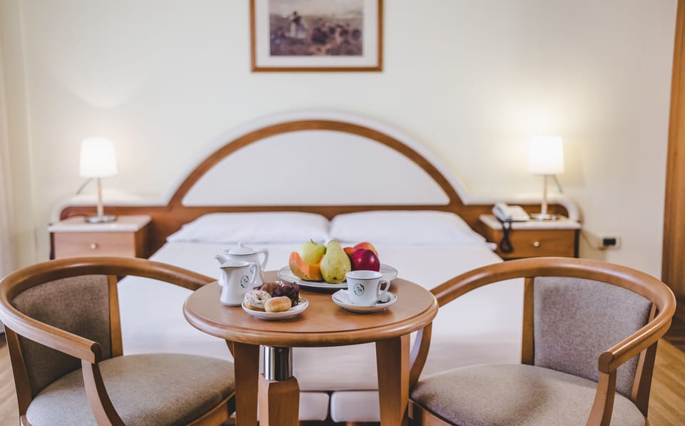 Premium bedding, down comforters, minibar, in-room safe